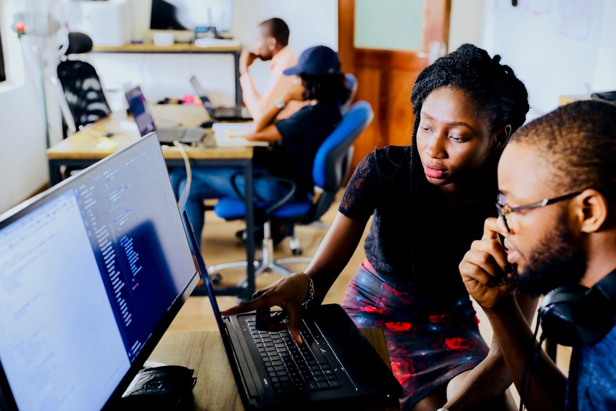 Engineers reviewing an issue together